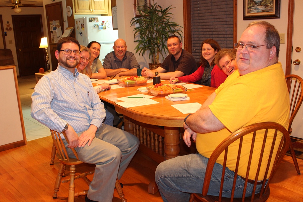 Group of people gathered around a table